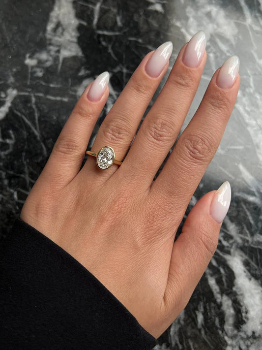 2.0 CT Oval Bezel Lab-Grown Diamond Engagement Ring – Modern Solitaire Elegance.
