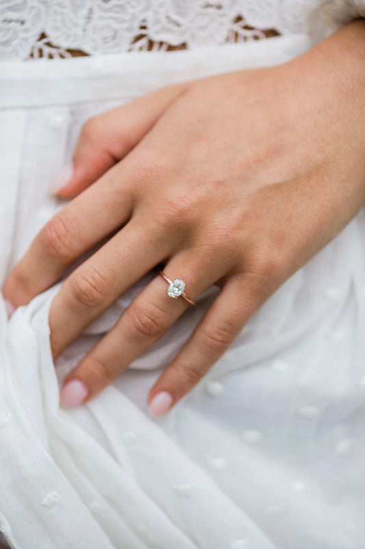 1.33 CT Oval Cut Solitaire Hidden Halo Moissanite Engagement Ring in Gold
