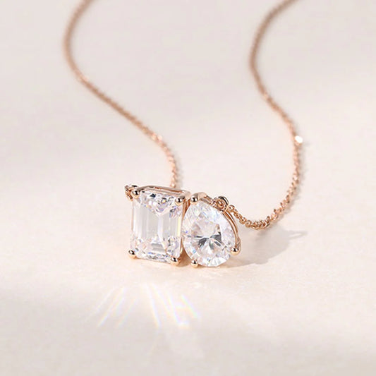 3.0 TCW Emerald & Pear Moissanite Two Stone Pendant Necklace in Solid Gold